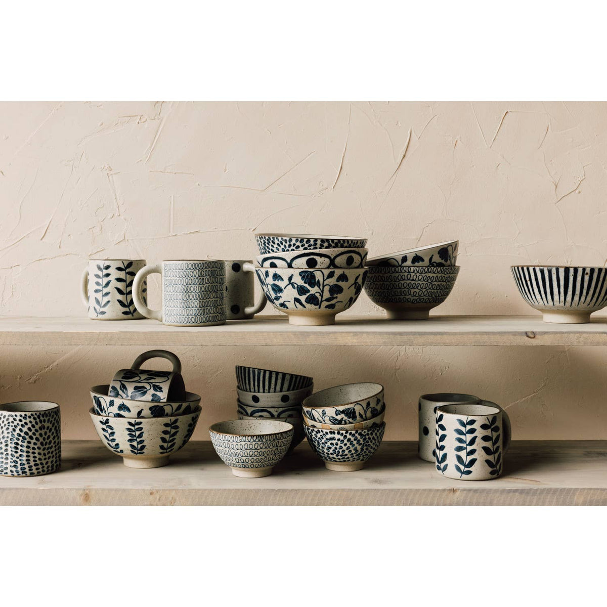 Danica Heirloom Vine Element bowl shown with coordinating serveware