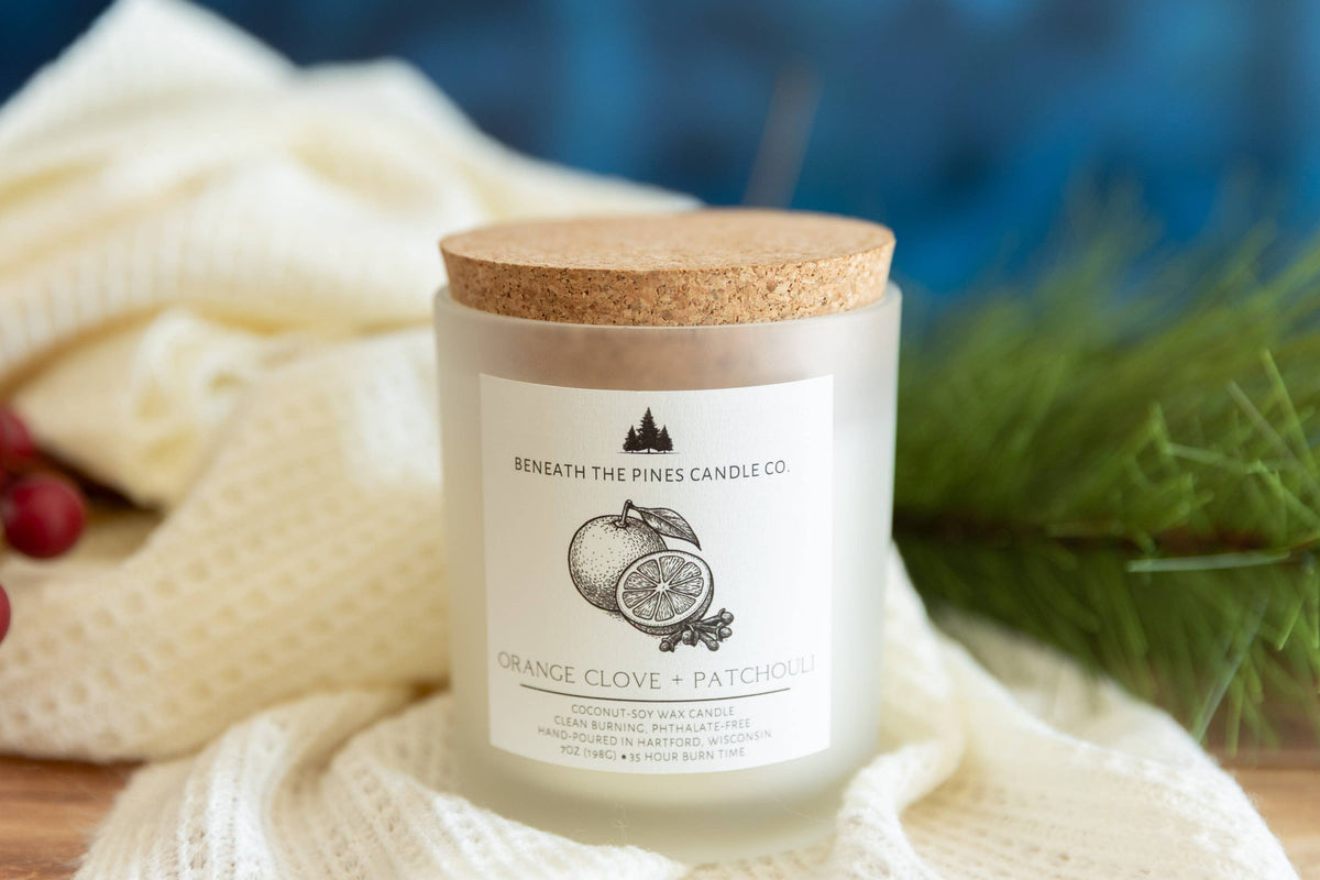 Beneath The Pines Candle Co. Orange Clove and Patchouli soy candle in glass jar