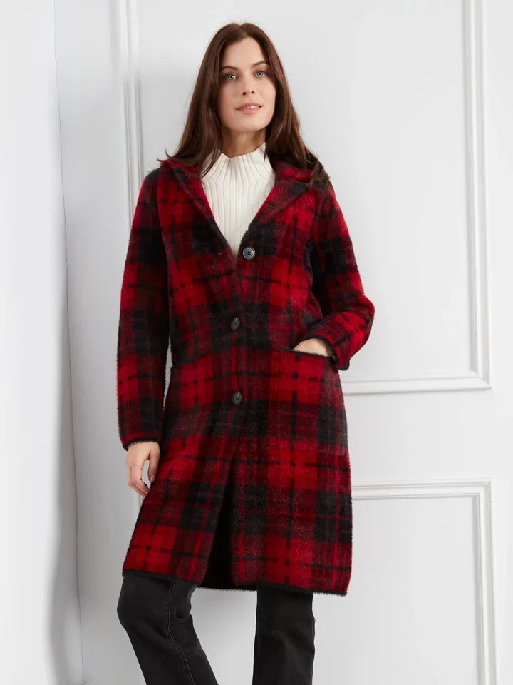 Long plaid knit coatigan by Charlie B with tailored neckline, button closure, and hip patch pockets