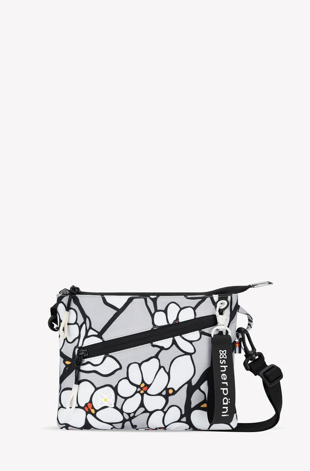 Sherpani Zoom slim RFID crossbody, magnolia print, front view