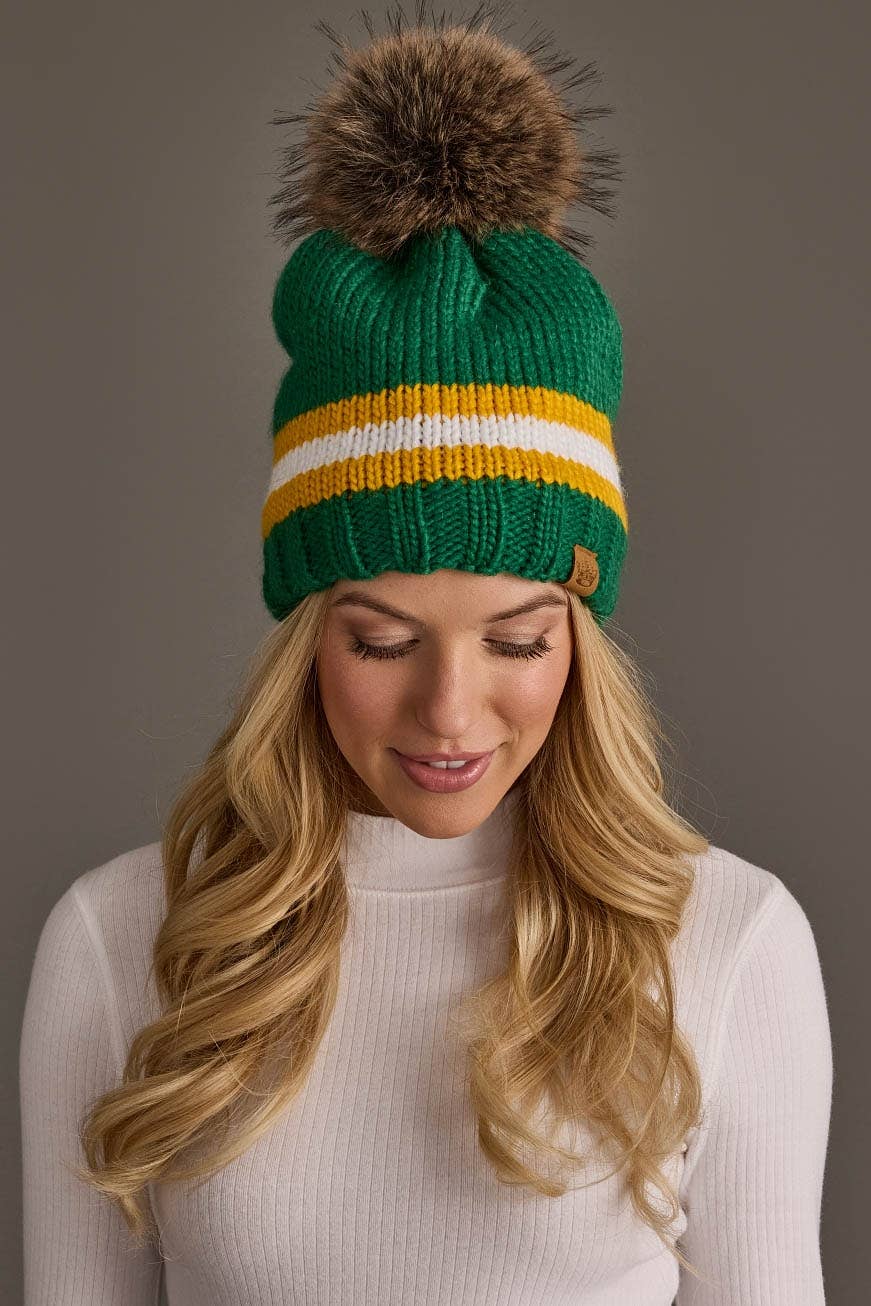 Panache Apparel Co. green, gold, and white striped knit pom hat with faux fur pom