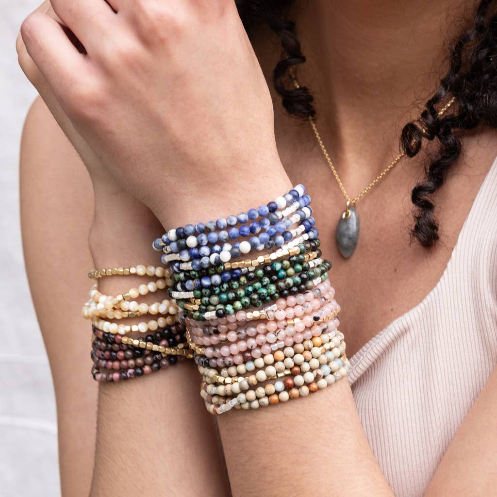 Scout Curated Wears rhodochrosite and gold stone wrap bracelet, stone of love