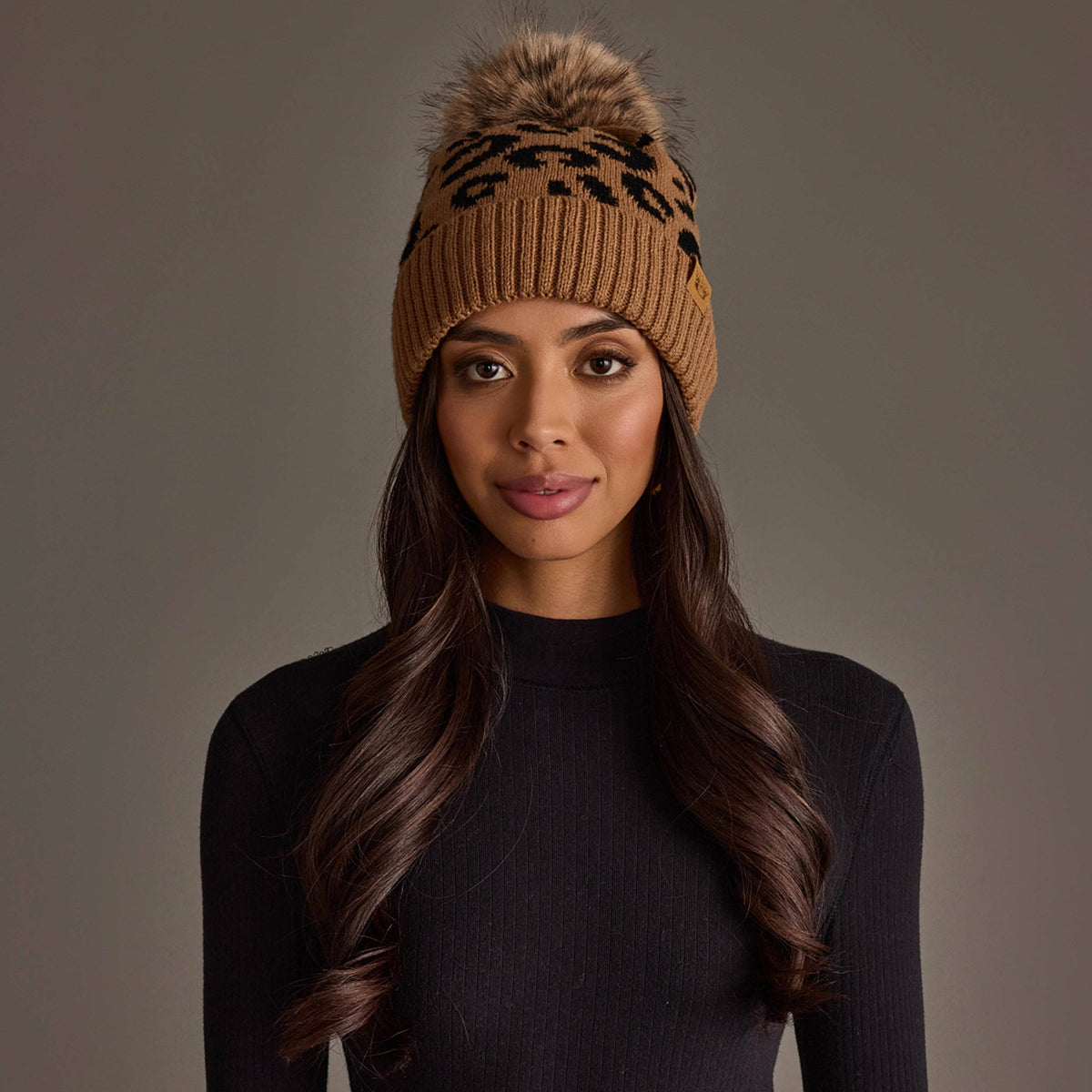 Panache Apparel Co. camel leopard print knit pom hat with faux fur pom