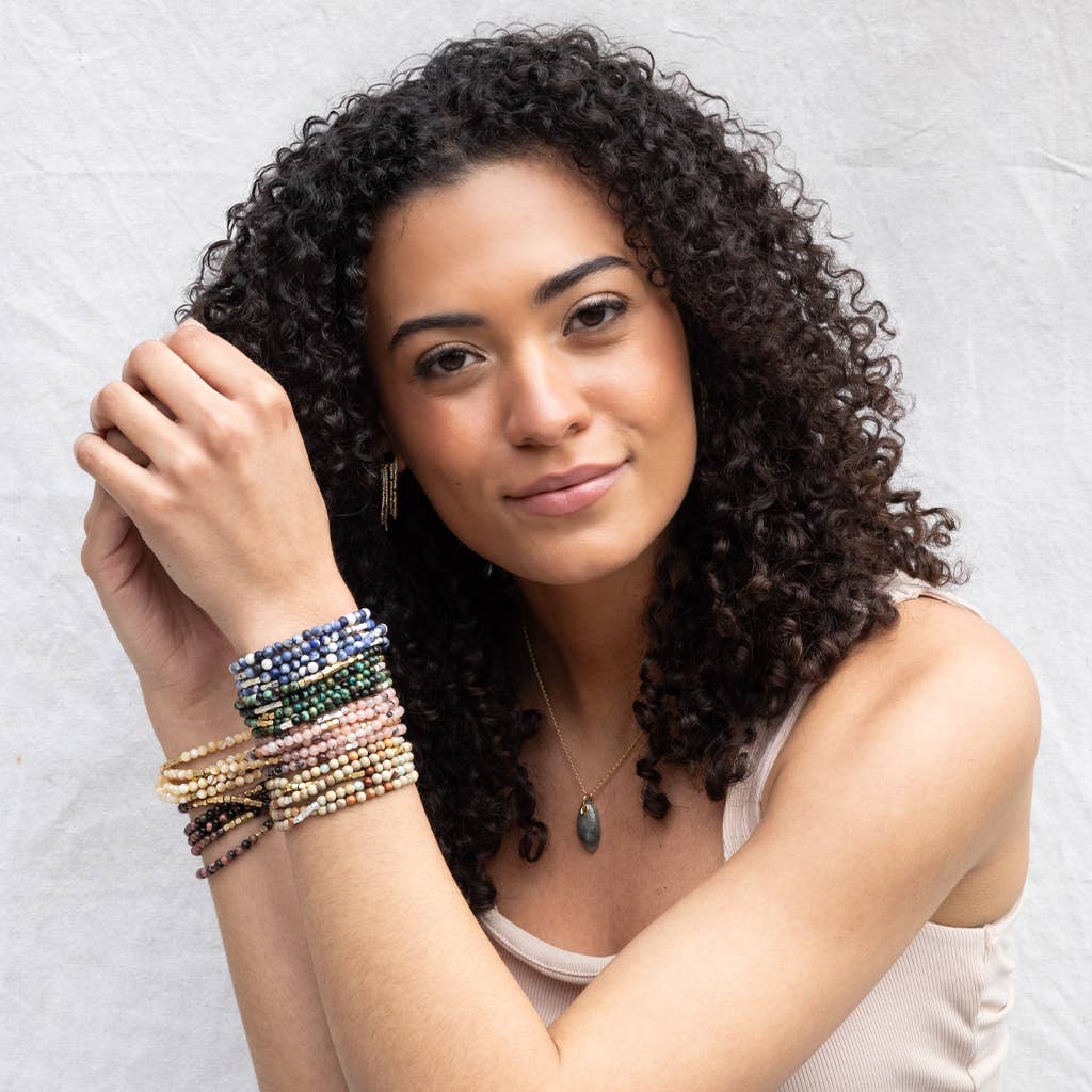 Scout Curated Wears rhodochrosite and gold stone wrap bracelet, stone of love