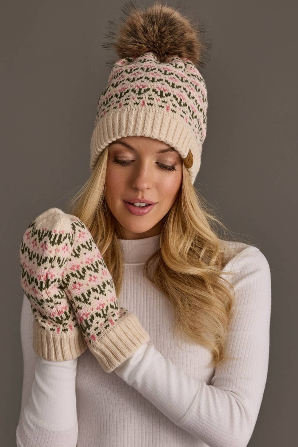 Panache Apparel Co. cream and pink floral knit pom hat with faux fur pom