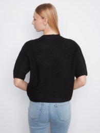 Black elbow sleeve sweater by Charlie B with mock neckline and button detail at the cuffs