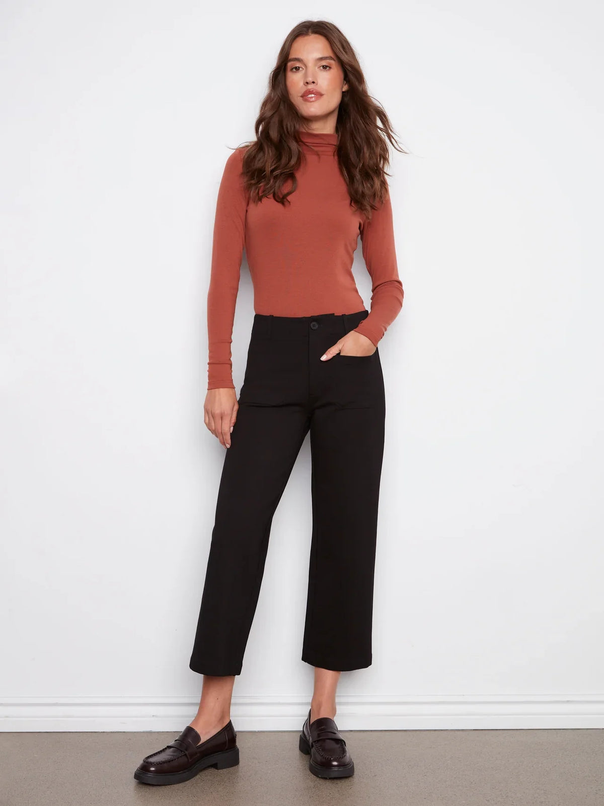Black wide leg ponte pants by Charlie B with patch pockets and cropped length