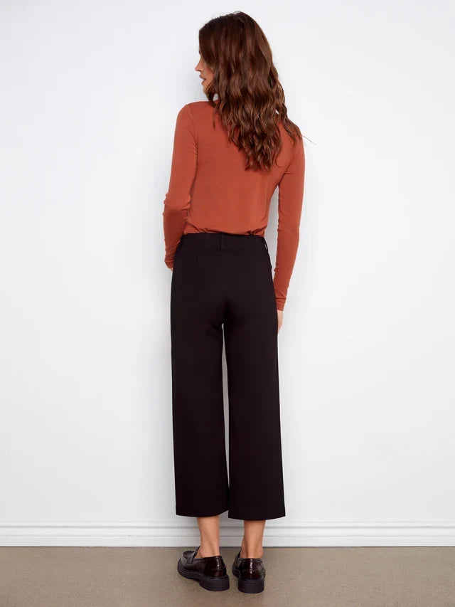 Black wide leg ponte pants by Charlie B with patch pockets and cropped length