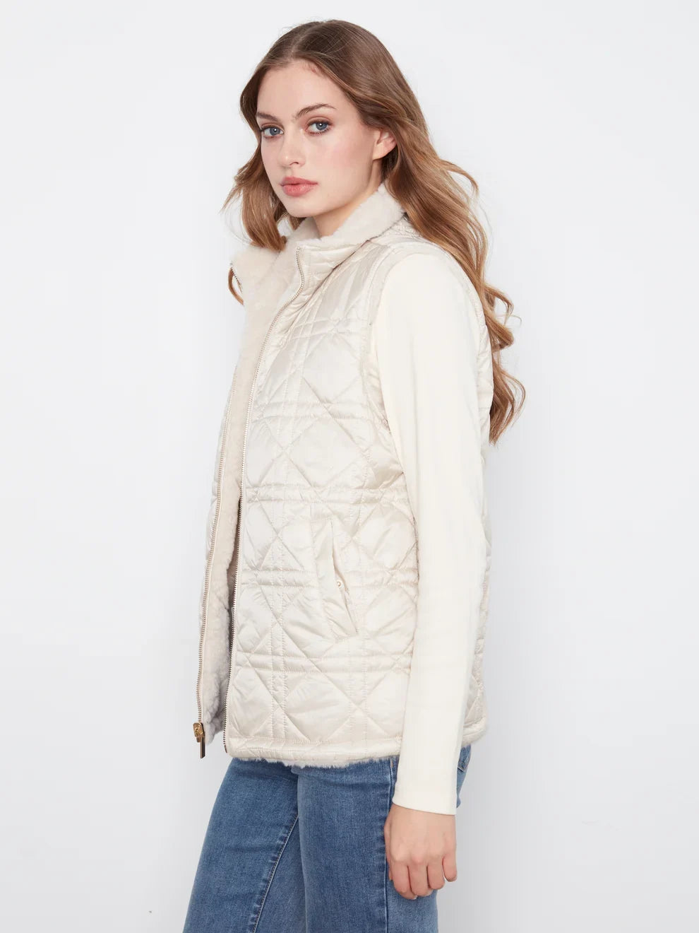 Pearl reversible vest by Charlie B with faux fur on one side and quilted fabric on the other, zip front, sleeveless
