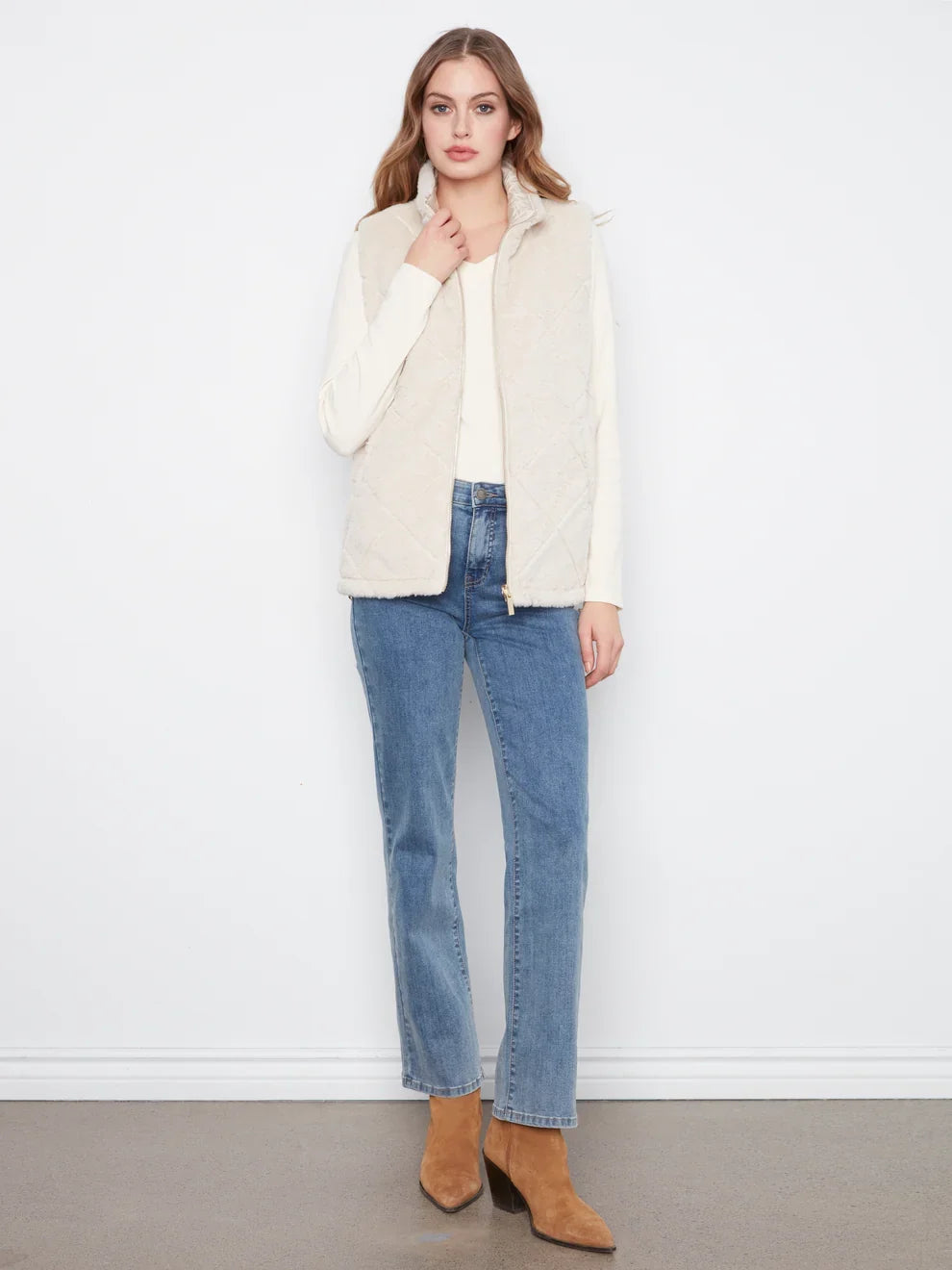 Pearl reversible vest by Charlie B with faux fur on one side and quilted fabric on the other, zip front, sleeveless