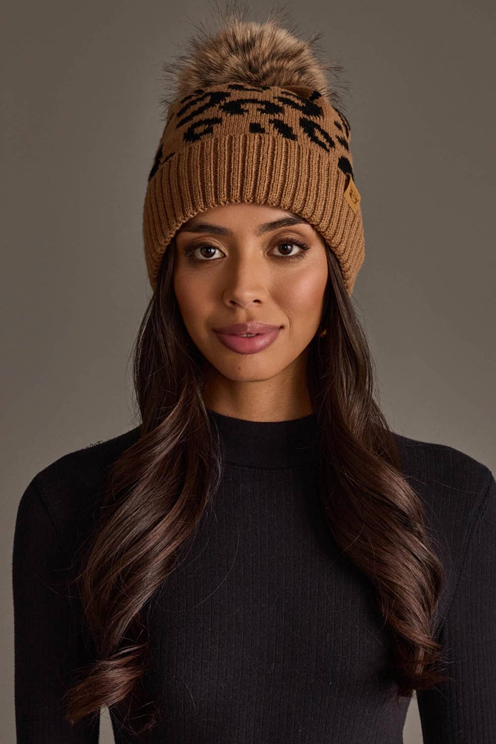 Panache Apparel Co. camel leopard print knit pom hat with faux fur pom