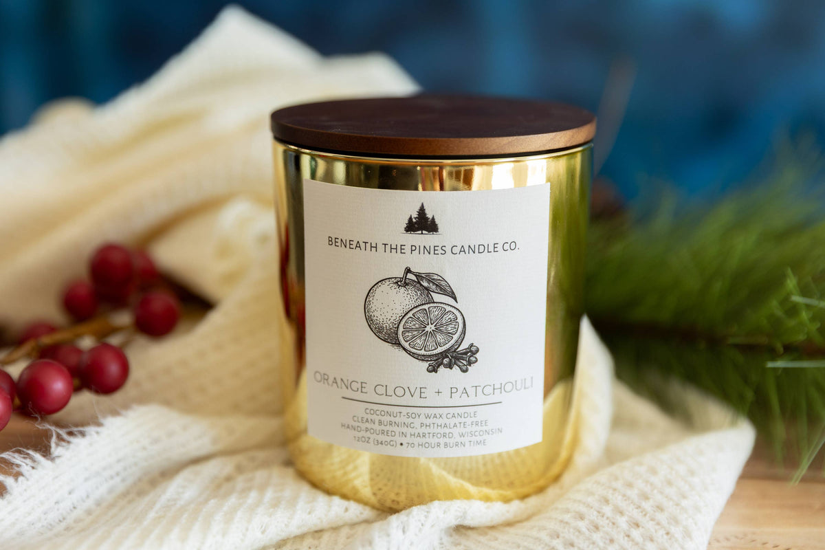 Beneath The Pines Candle Co. Orange Clove and Patchouli soy candle in glass jar